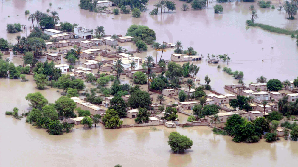 An aerial view of a village inundated by flooding in Pakistan