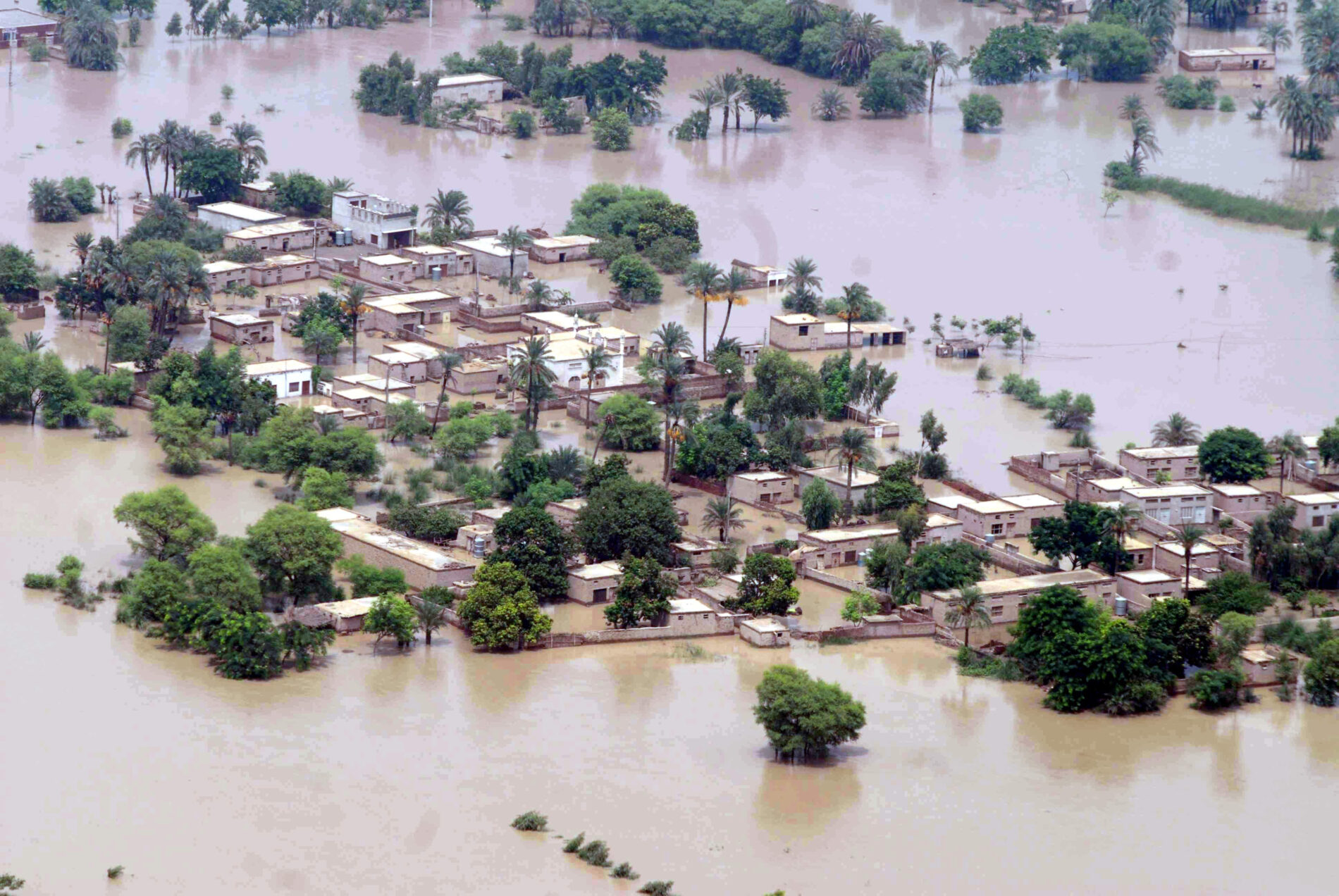 An aerial view of a village inundated by flooding in Pakistan