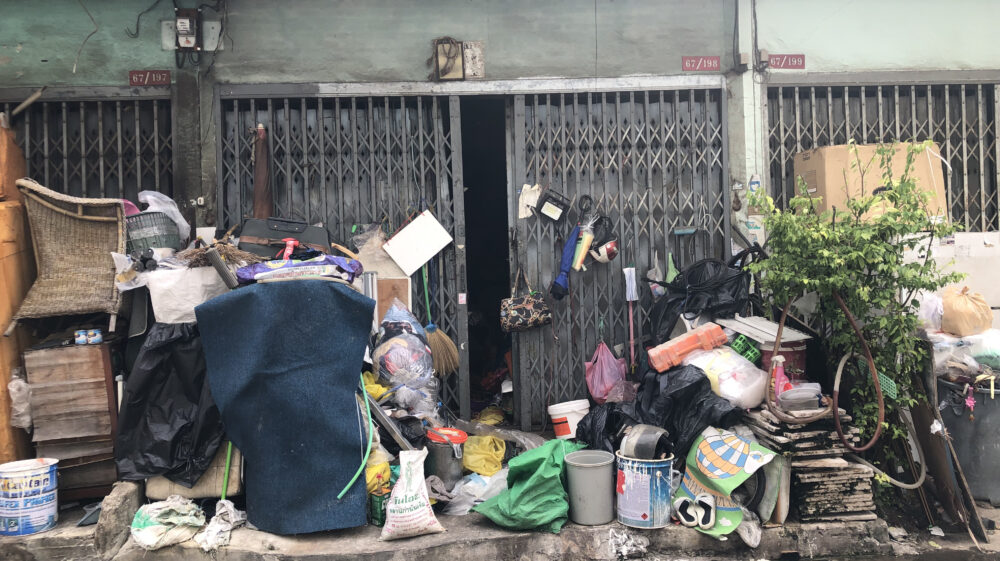 Family-owned waste shop in Yannawa, Bangkok overflowing with waste materials