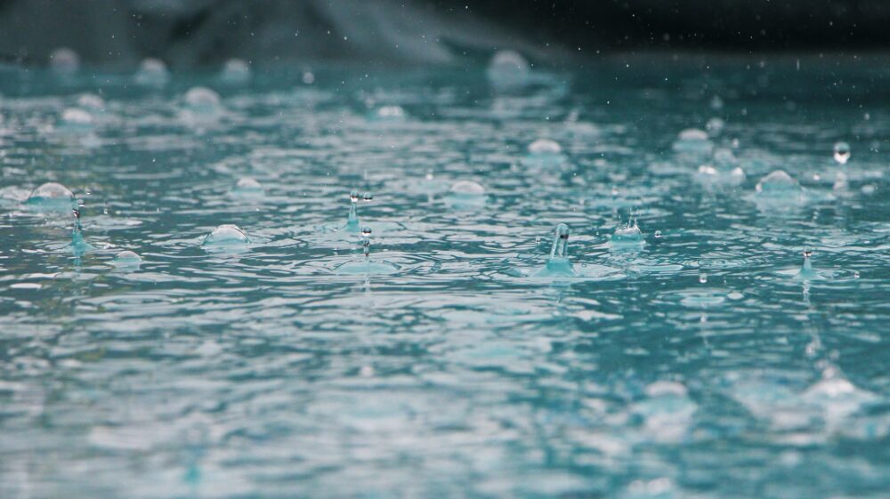 Raindrops on water