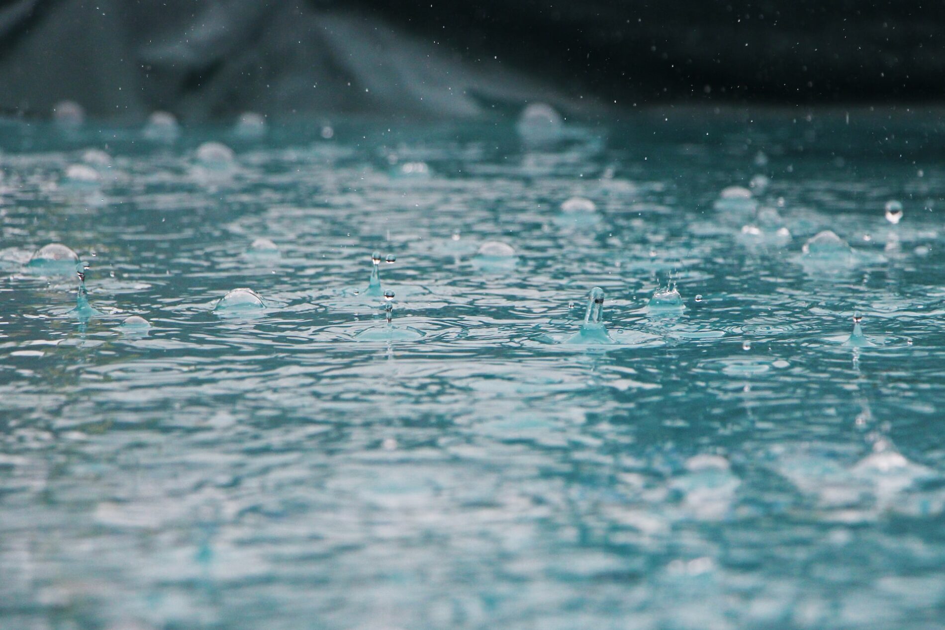 Raindrops on water
