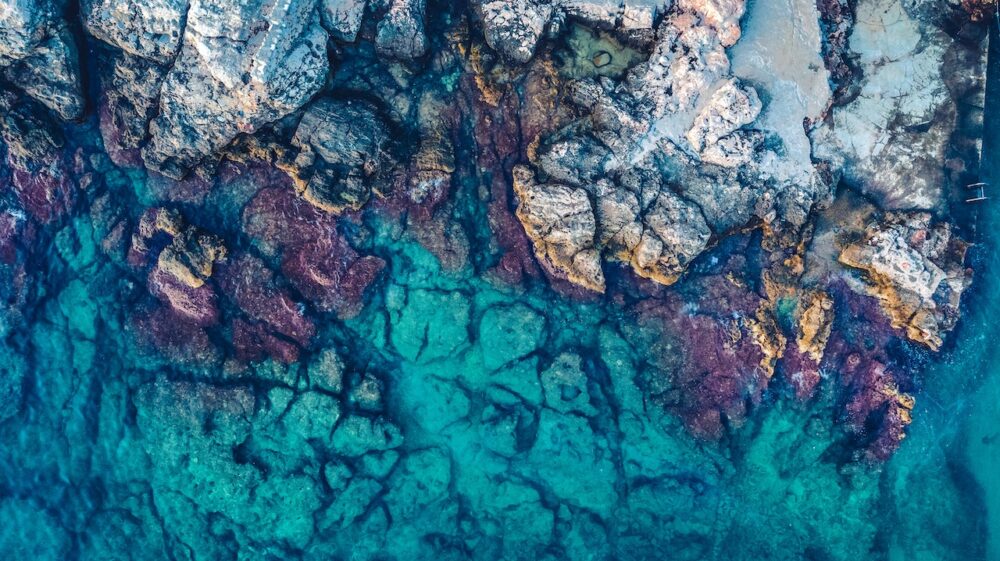 Aerial Photography of Rocks Beside Body of Water, Dubrovnik, Croatia