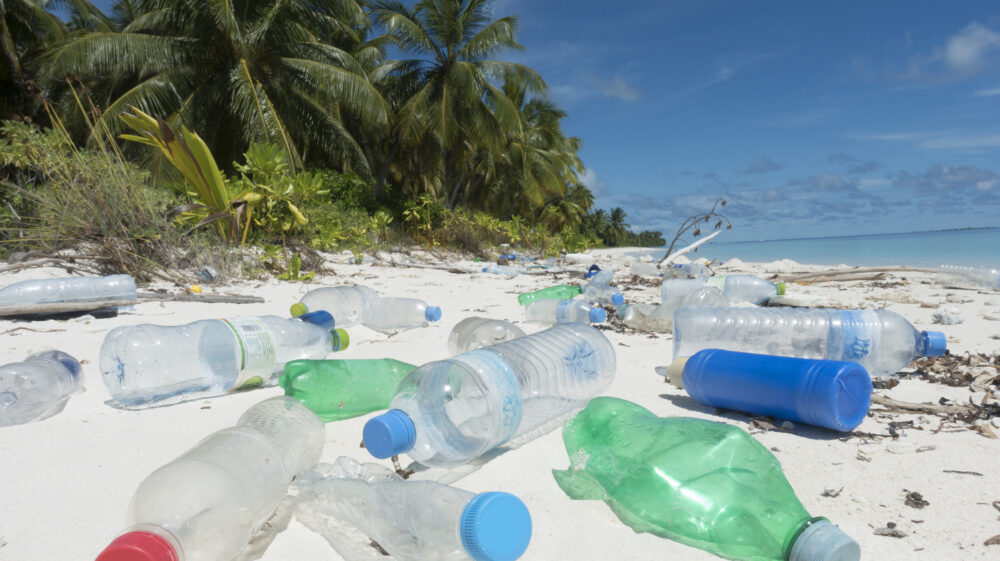 Plastic washed up on tropical island.