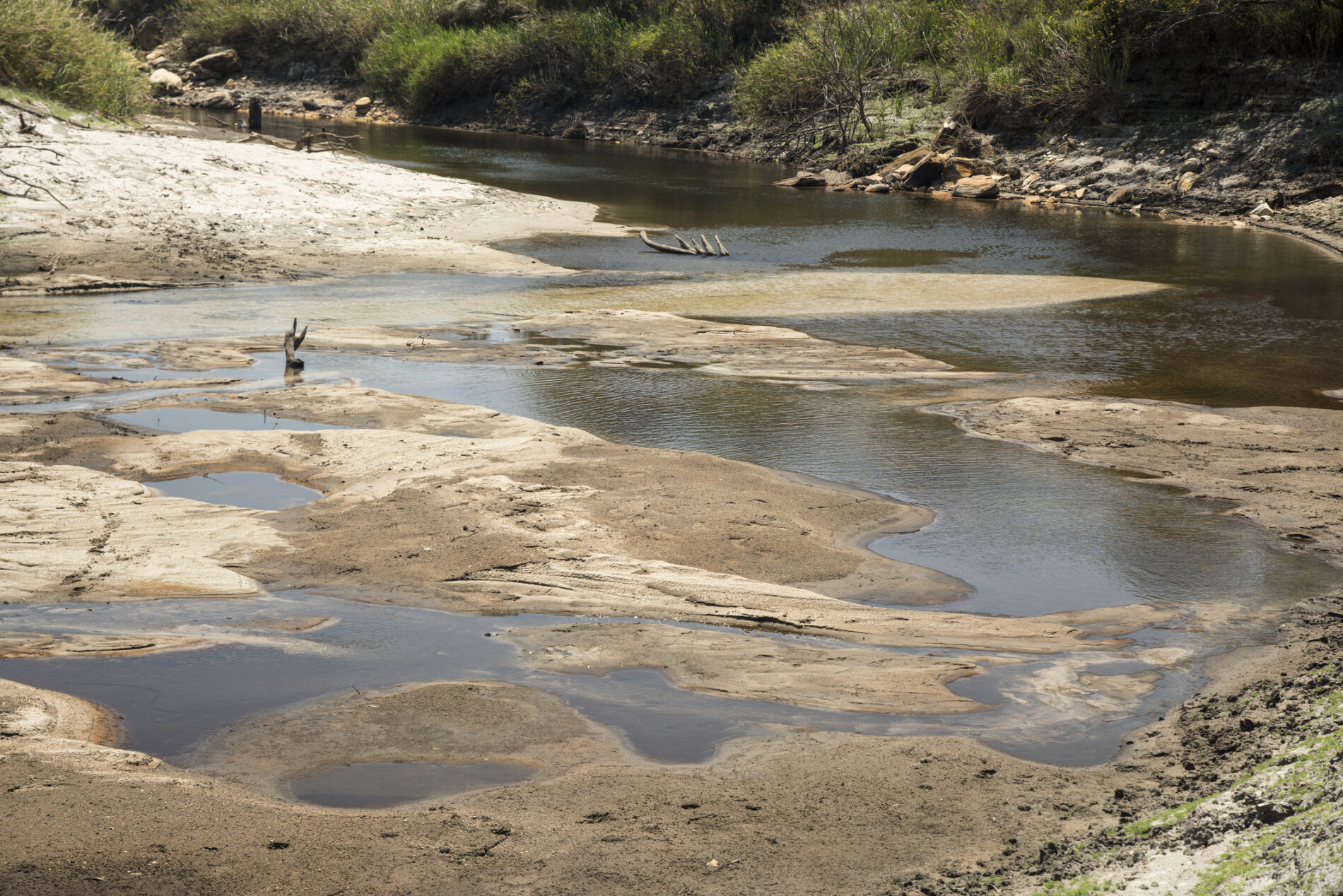 A nearly dry riverbed exposes the river floor in Brazil