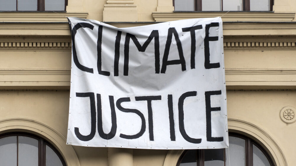 Climate justice sign