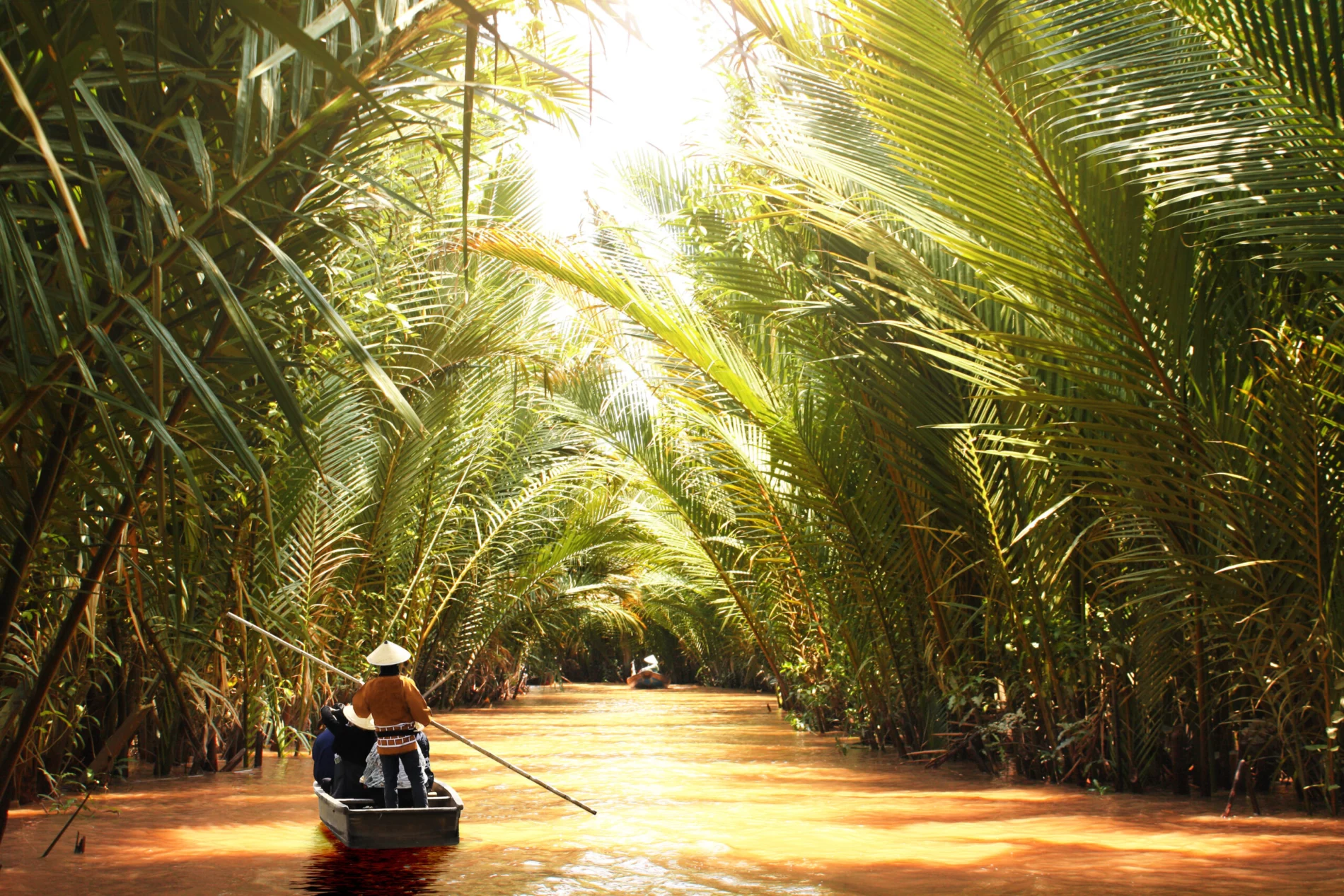 People boating in the delta of Mekong river
