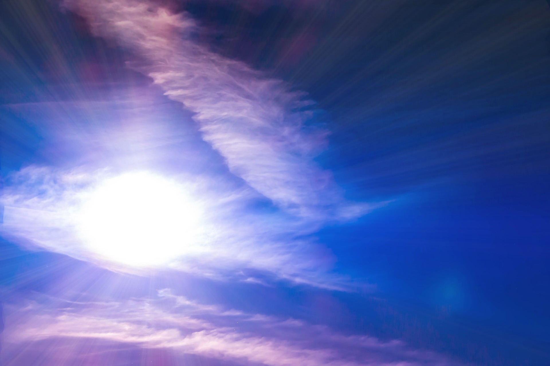 Blue sky with sun and sunbeams