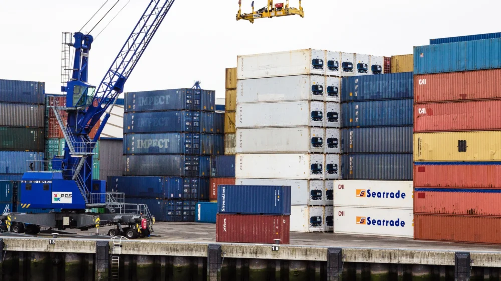 Cargo containers waiting in port.
