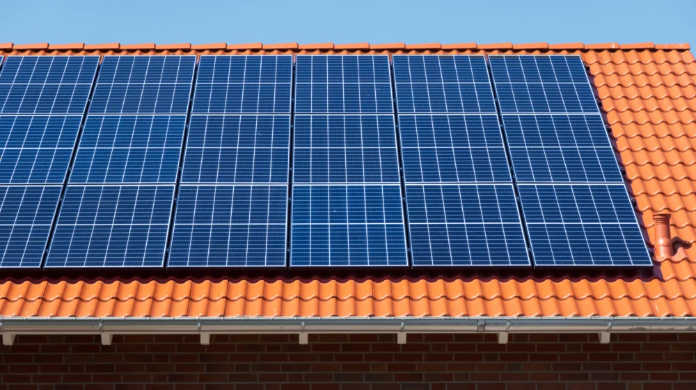 Side view of a large solar panel on the roof