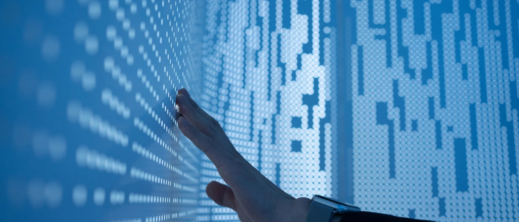 Conceptual image using hand to touch screen