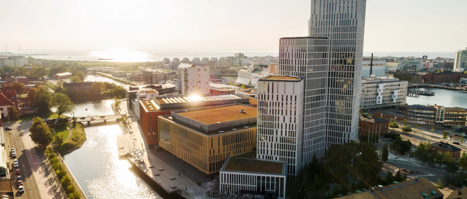 Aerial view of a modern high-rise building in a large city by the sea. Malmö Live is a neighborhood with concert halls, hotels and residences.
