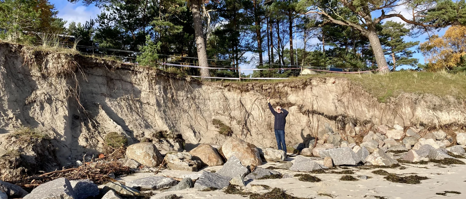 erosion escarpment with Anders Pålsson for scale