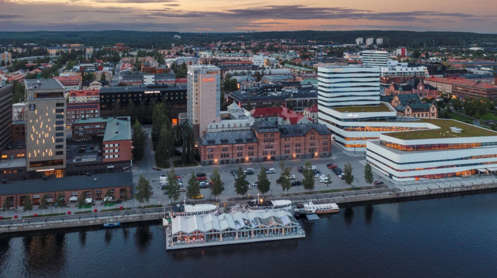 Evening view of downtown Umeå by the Ume river on a summer evening
