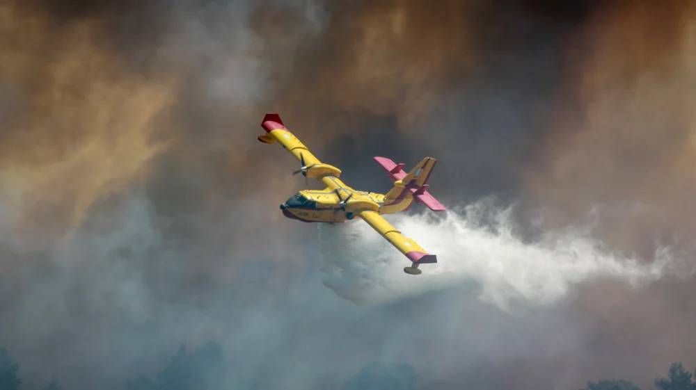 Wildfire in Varnavas, Greece, being fought with firefighting aircraft