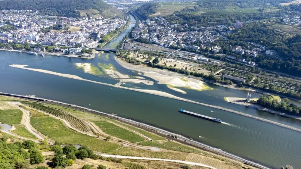Aerial view of the confluence of Nahe and Rhine River at Bingen, Germany - Visible rocks and sandbars due to extraordinary low water level after a long period of drought in 2022.