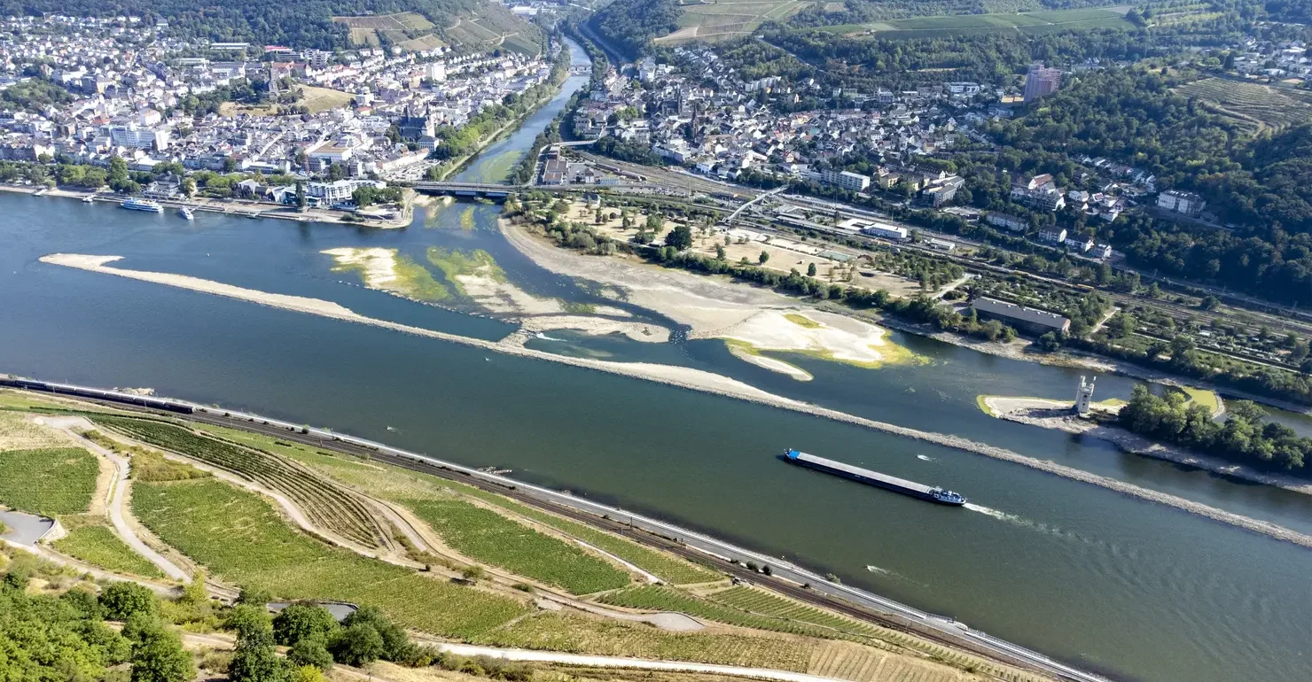Aerial view of the confluence of Nahe and Rhine River at Bingen, Germany - Visible rocks and sandbars due to extraordinary low water level after a long period of drought in 2022.