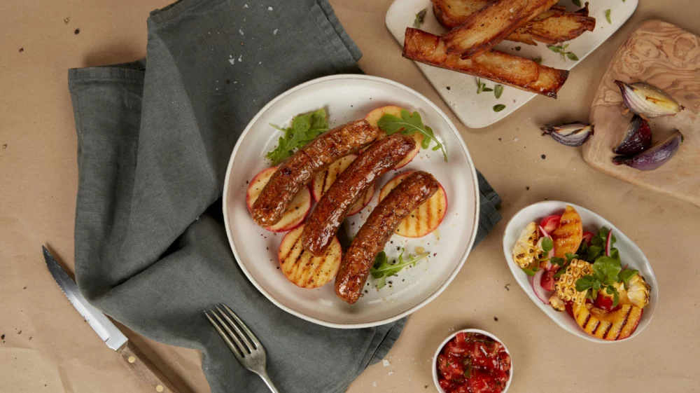 Plate of sausage grown from cultivated animal cells