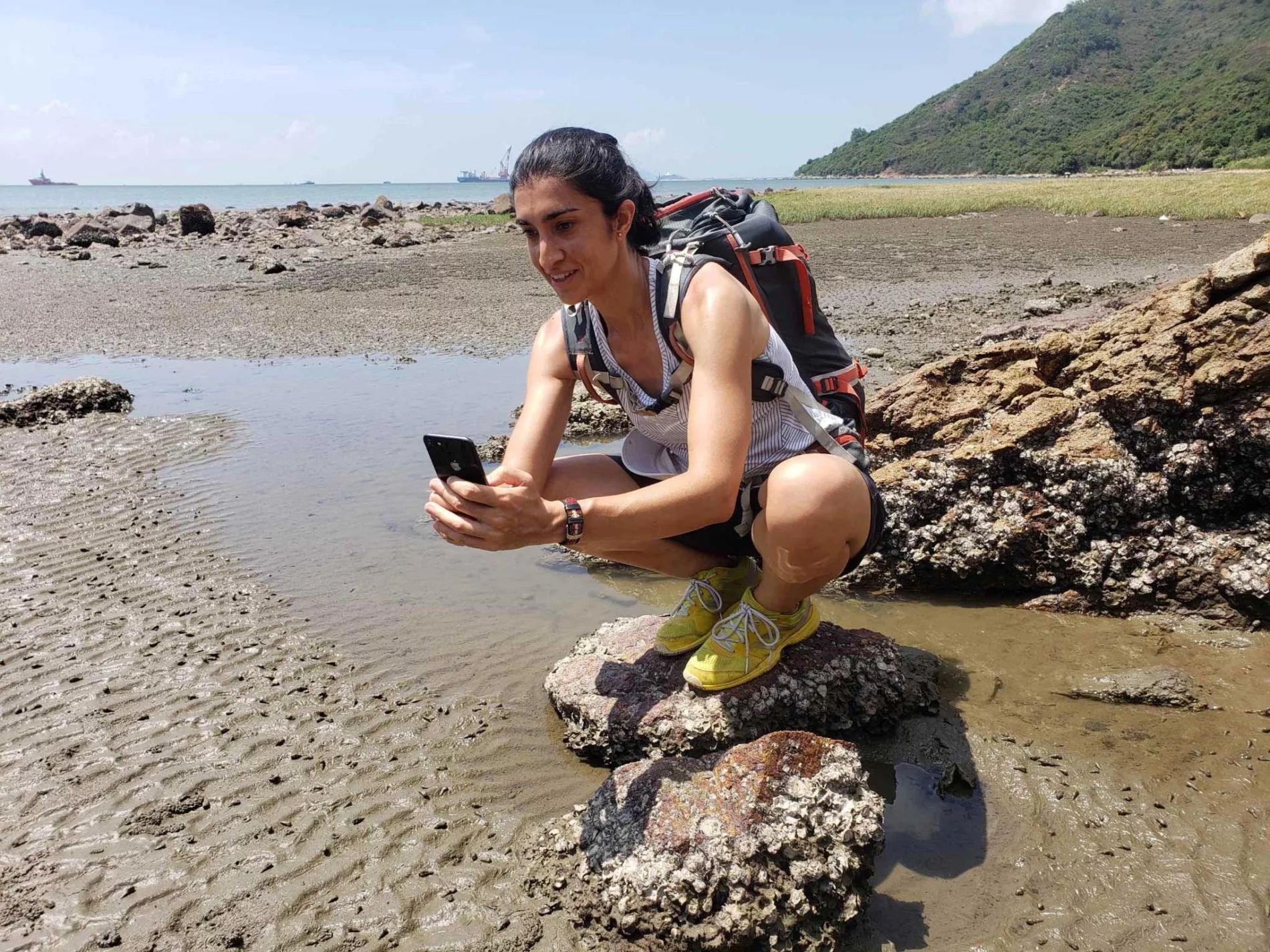 Smriti takes a photo of a sea slug on the Hong Kong coast