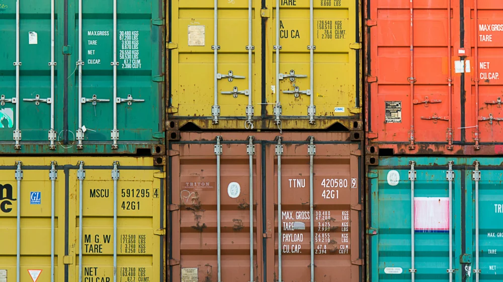 Green and Brown Cargo Containers