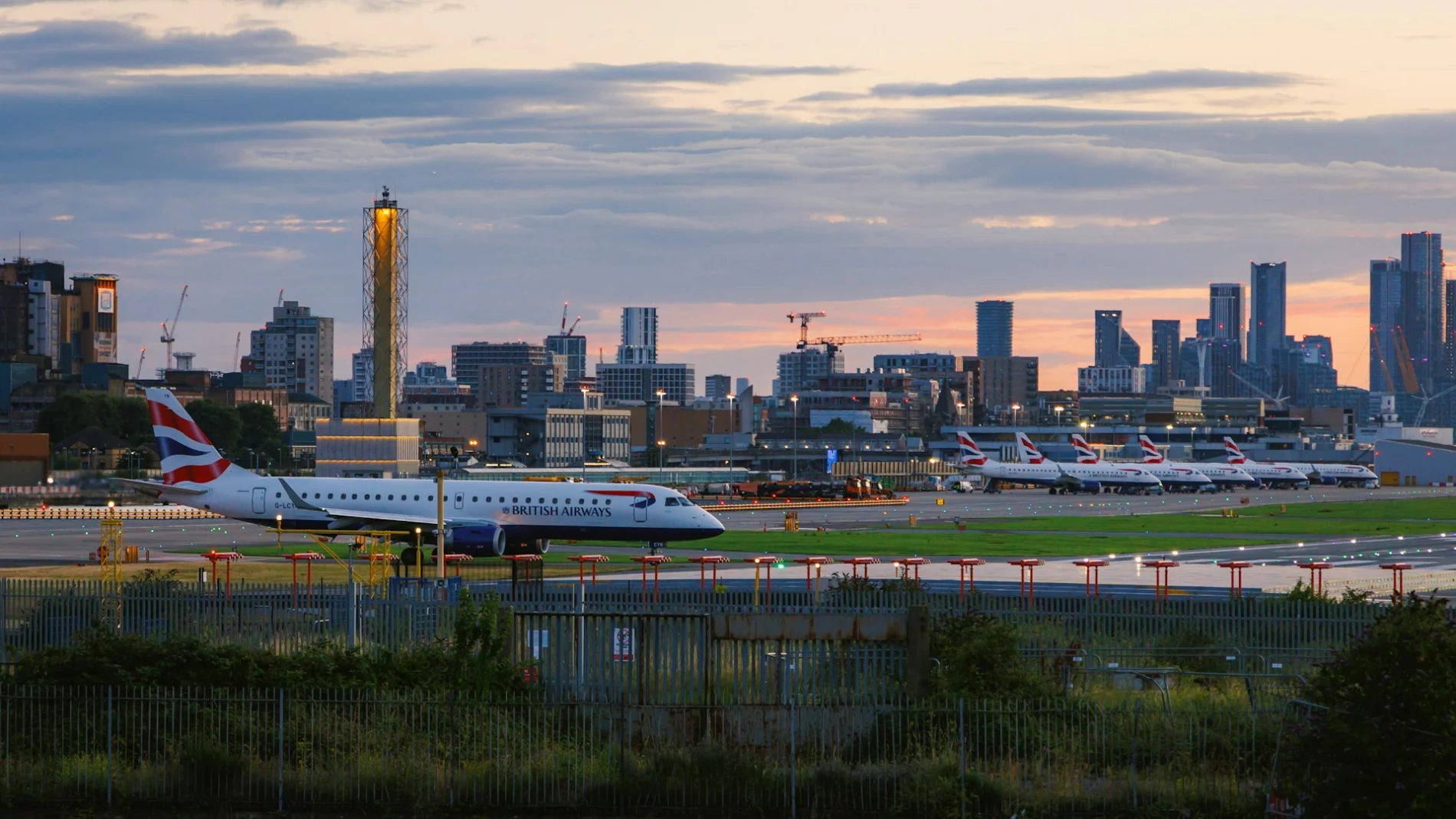 A British Airways aircraft lining up to runway at London City Airport for departure