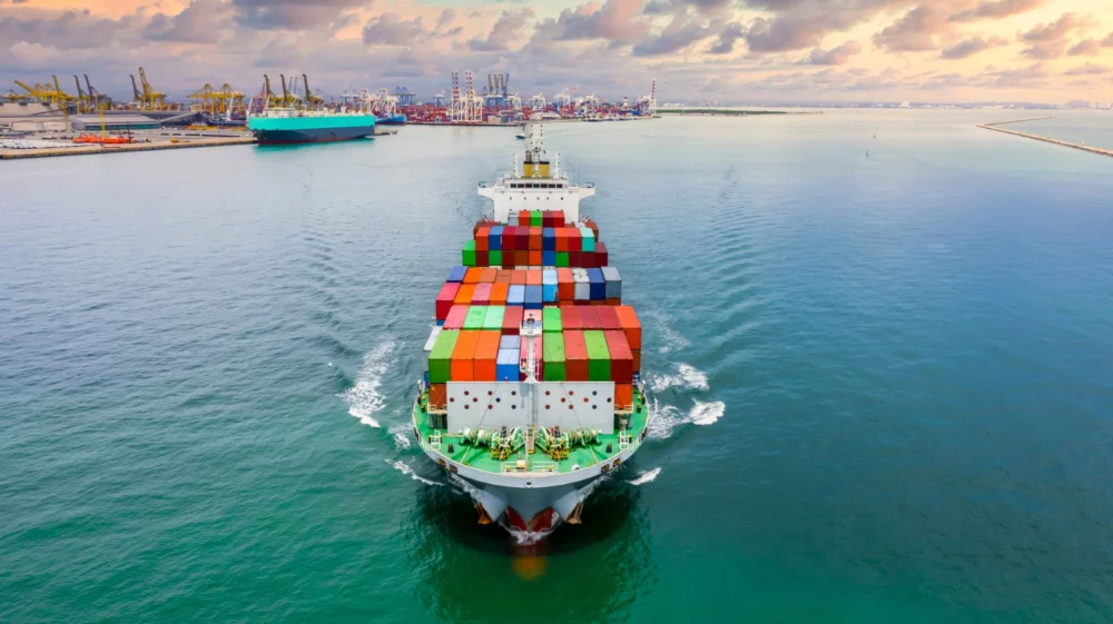 Container cargo vessel transporting goods worldwide, Thailand.