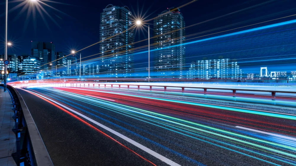 Colorful light trails and cityscape of Daiba at night. Minato-ku, Tokyo, Japan.