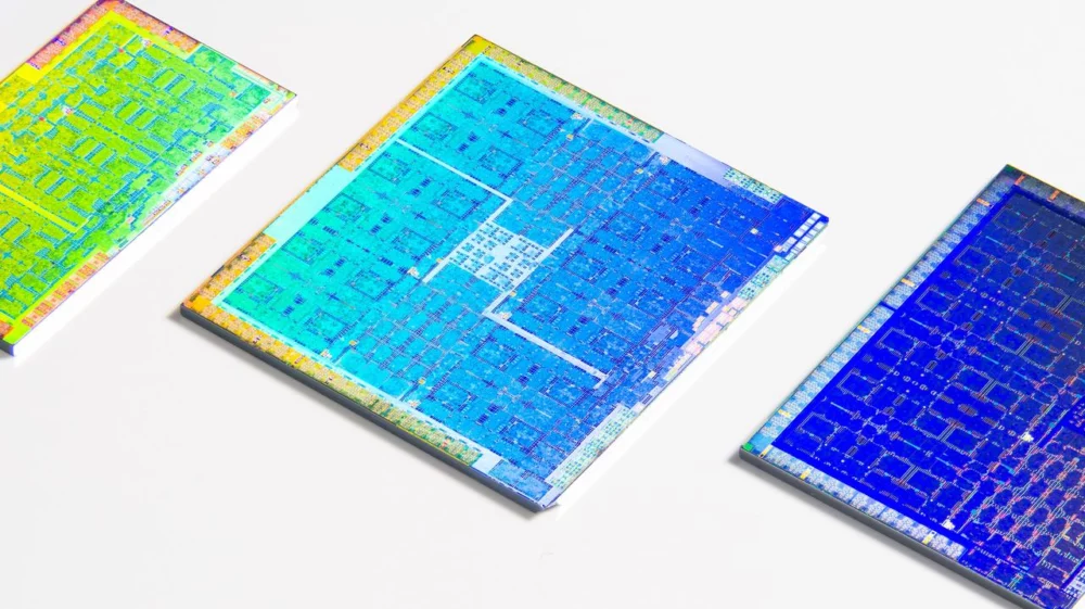 Close-up of three colorful microchips on a white background.