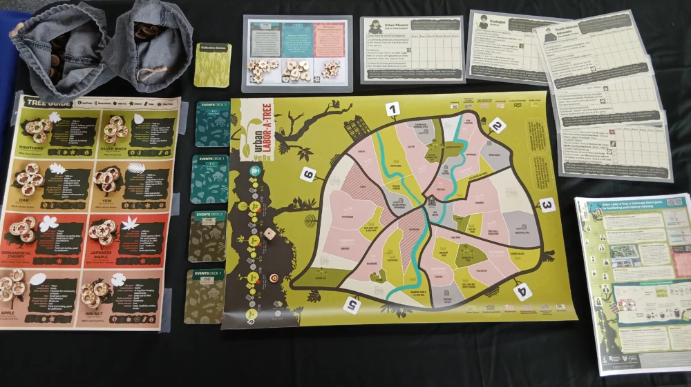 The Urban-Labor-A-Tree board game with dices and trees and cards for the gaming