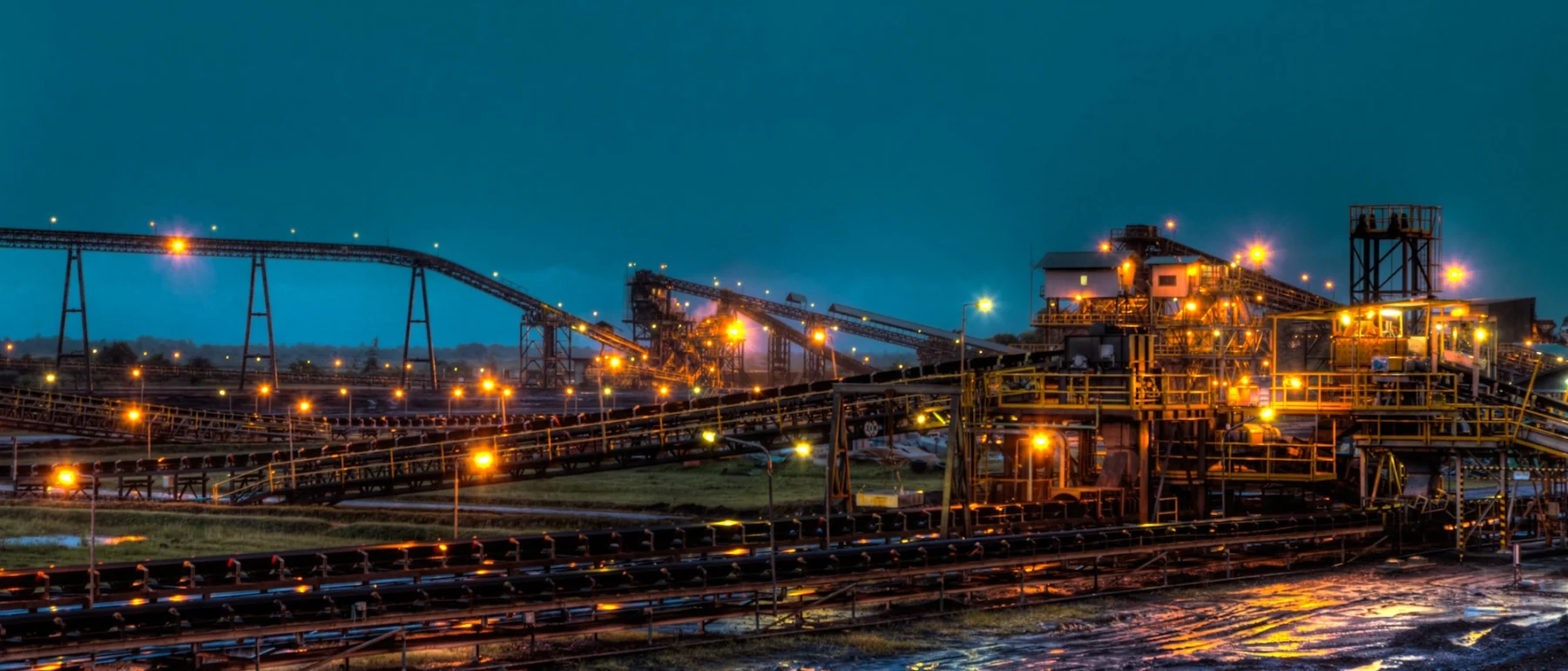 Mining complex illuminated by faint lights at night