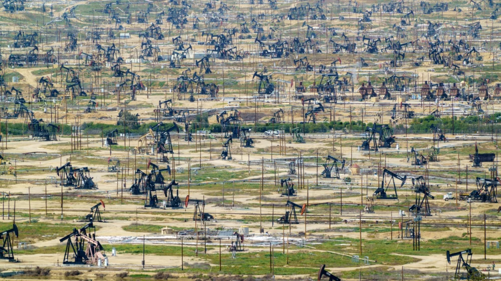 Oil pump jacks in Oil city, Kern County, California. This intensive drilling operation is part of the Oil Field in Bakersfield, California, USA.