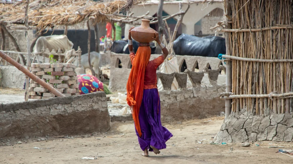Woman carrying water