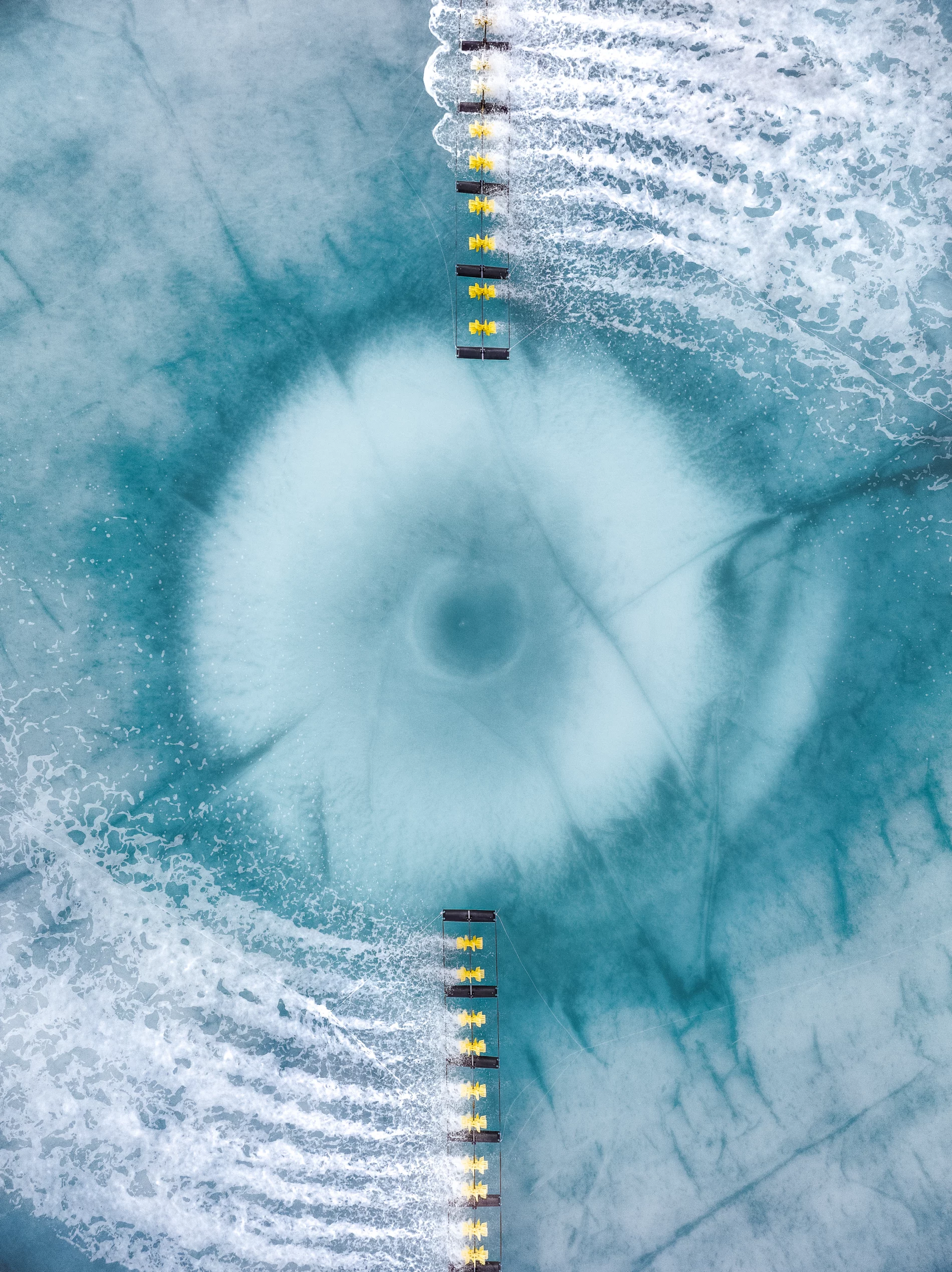 Overhead view showing a sprinkler system in a water treatment tank, Vietnam.