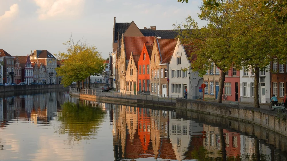 Group of houses by a canal in Belgium.