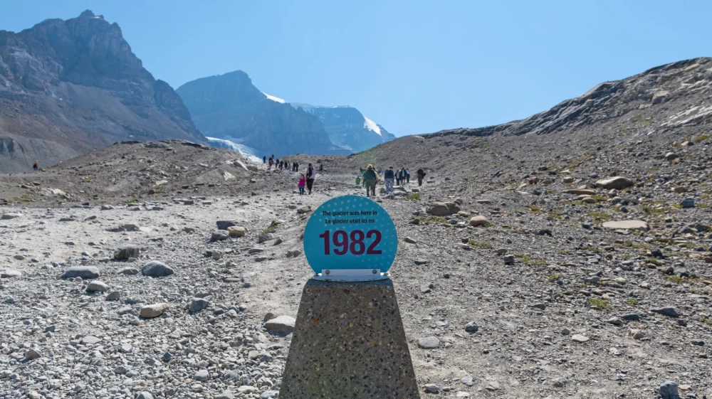 A marker shows the retreat of a glacier in Canada since 1982.