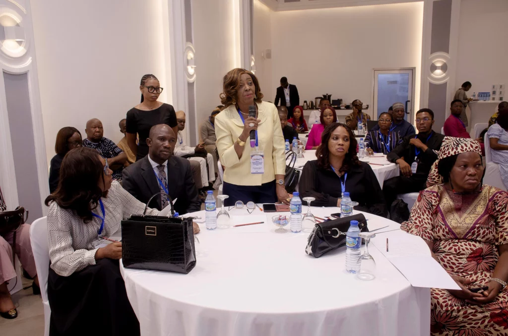 Participant engagement during the workshop in Abuja