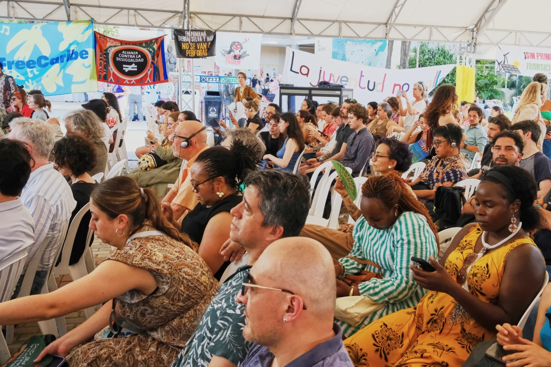 Crowd of people are packed, seated in a session at the 2026 Santa Marta First Conference on Transitioning Away from Fossil Fuels