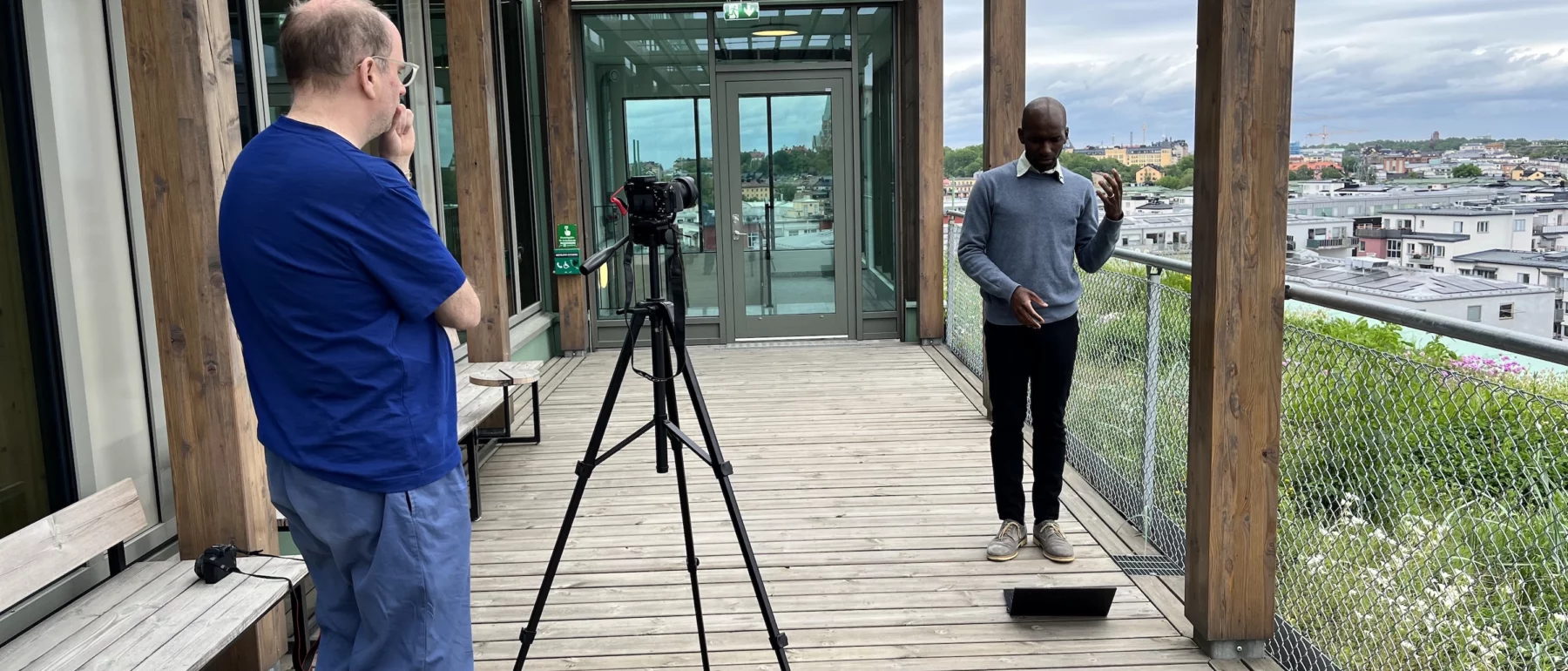 Behind the scenes filming an interview with an SEI colleague