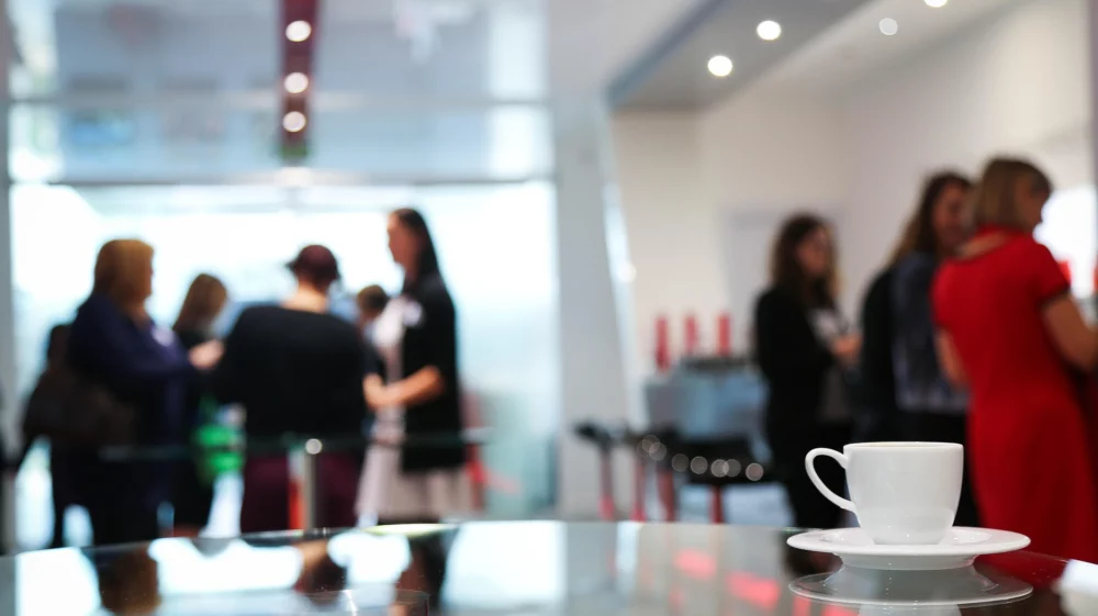 People networking over coffee.