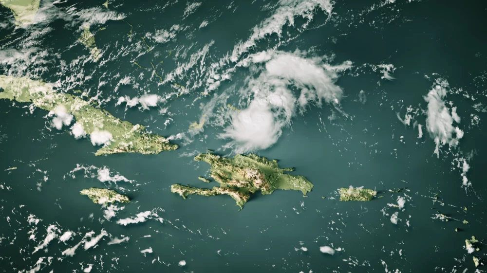 3D render of a topographic map of the Caribbean Sea showing clouds and Category 1 Hurricane Oscar north of Hispaniola from 2024.