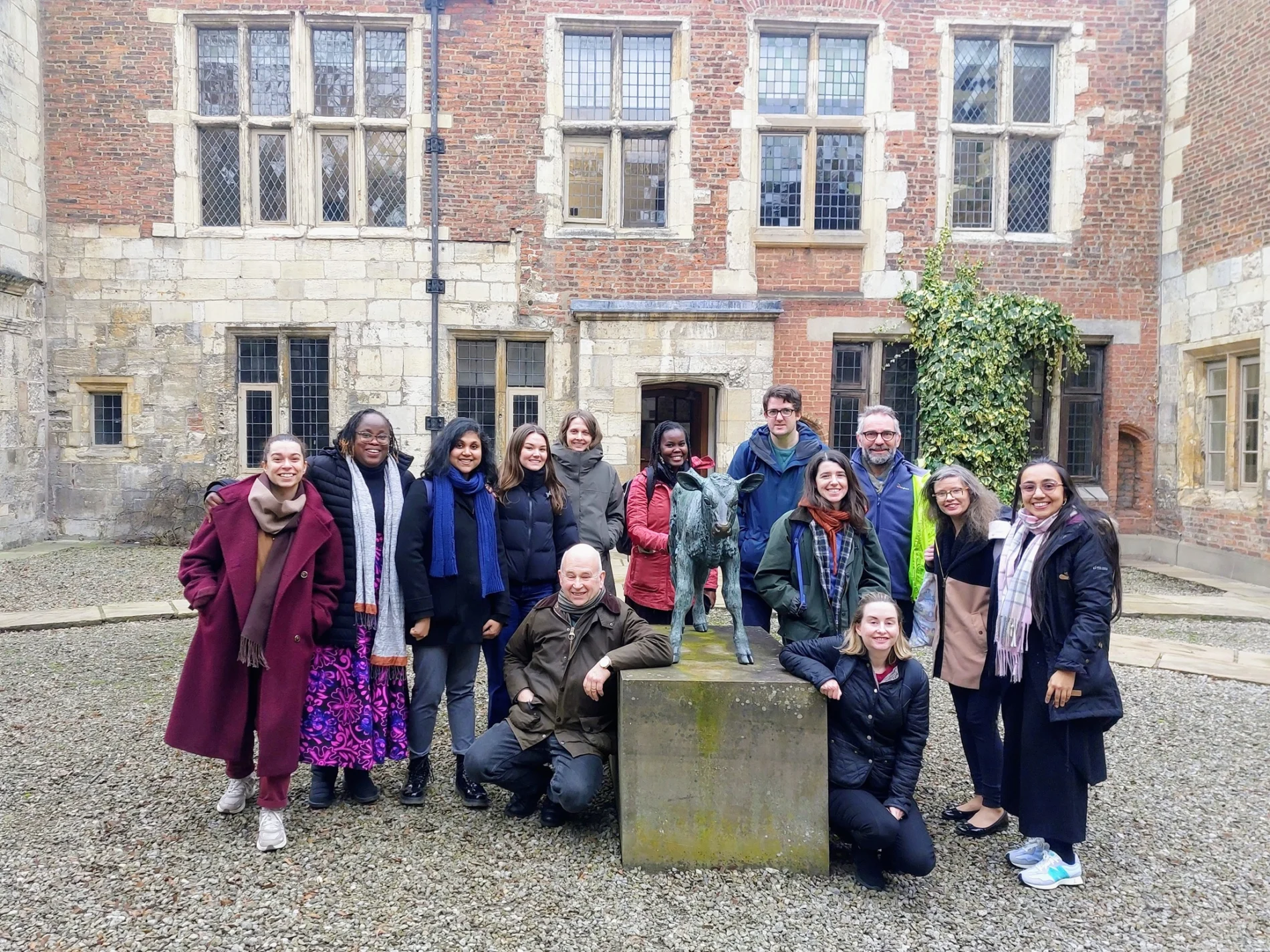 Group photo of SEI York AIr Quality research group in front of a brick building.