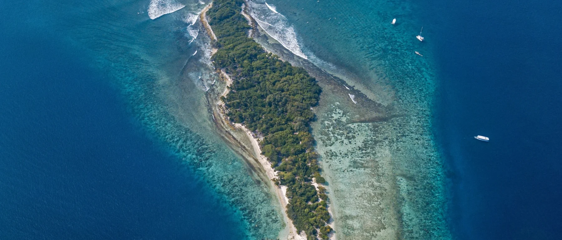 Tropical island on sea, aerial view