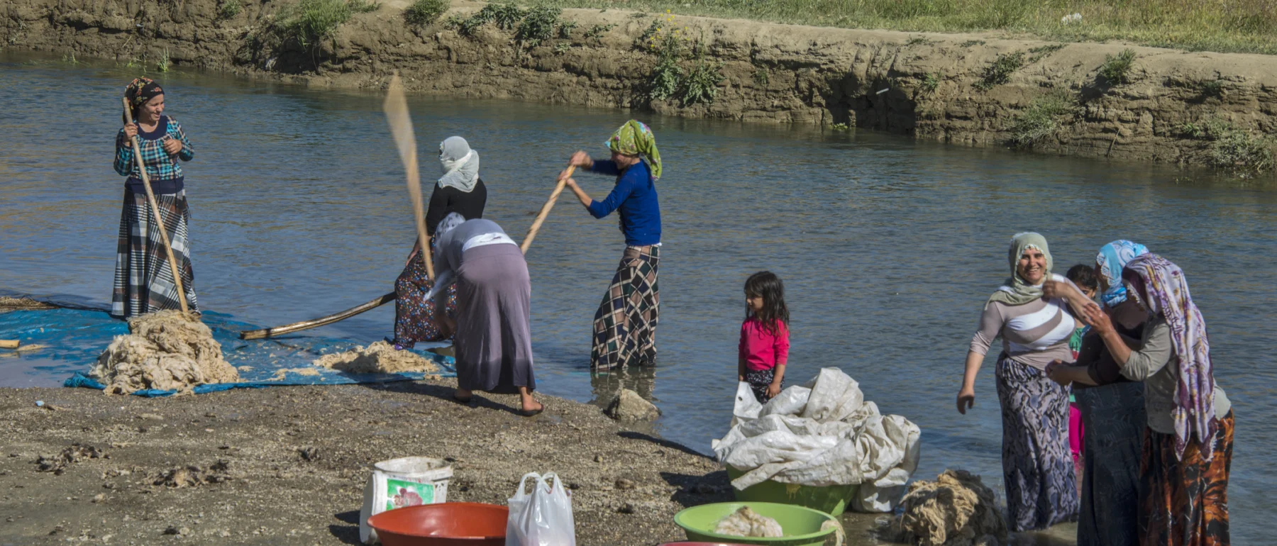 Women traditionally washing and cleaning wool in the river in Andac, Van in Eastern Turkey